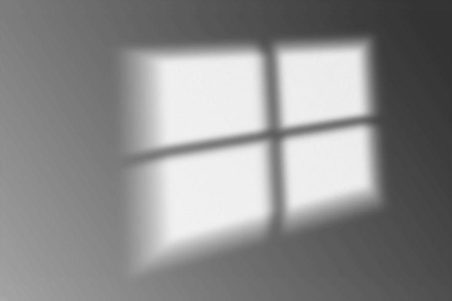 Shadow of a window frame, cast on the wall